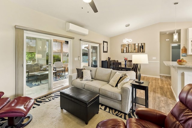 16-2081 Ohia Dr, Pahoa, HI 96778 - living room featuring an AC wall unit, light wood-type flooring, vaulted ceiling, and a ceiling fan