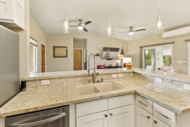 16-2081 Ohia Dr, Pahoa, HI 96778 - kitchen with ceiling fan, dishwasher, a wall mounted air conditioner, and white cabinets