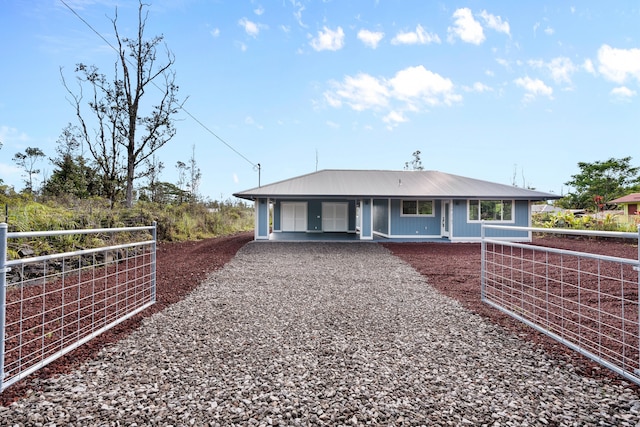 16-2147 Stardust Dr, Pahoa, HI 96778 - view of front of property featuring driveway and metal roof