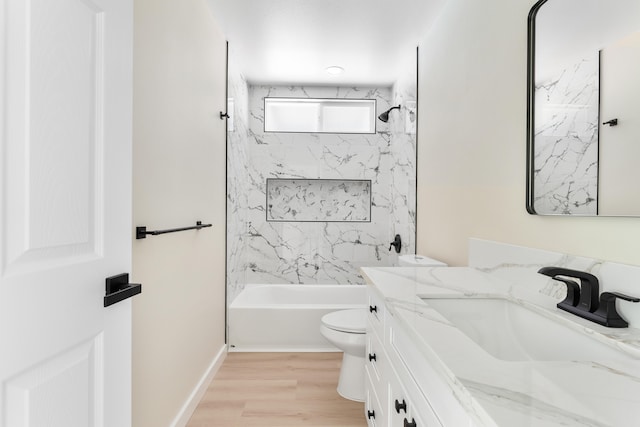 16-2147 Stardust Dr, Pahoa, HI 96778 - bathroom with vanity, toilet, shower / bath combination, wood finished floors, and baseboards