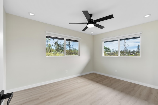 16-2147 Stardust Dr, Pahoa, HI 96778 - unfurnished room with healthy amount of natural light, light wood-type flooring, baseboards, a ceiling fan, and recessed lighting