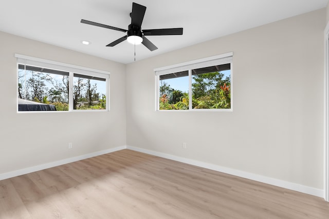 16-2147 Stardust Dr, Pahoa, HI 96778 - spare room featuring light wood-type flooring, healthy amount of natural light, baseboards, and recessed lighting