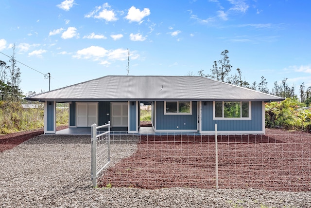 16-2147 Stardust Dr, Pahoa, HI 96778 - ranch-style house featuring metal roof and a porch