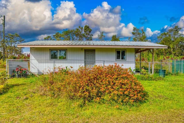 11-3258 Pa Alii St, Volcano, HI 96785 - view of front of house featuring metal roof and central air condition unit