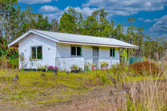 11-3258 Pa Alii St, Volcano, HI 96785 - view of front of property with metal roof
