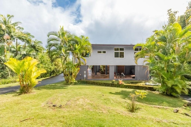 27-577 Old Mamalahoa Hwy Unit 2, Papaikou, HI 96781 - back of property featuring a lawn