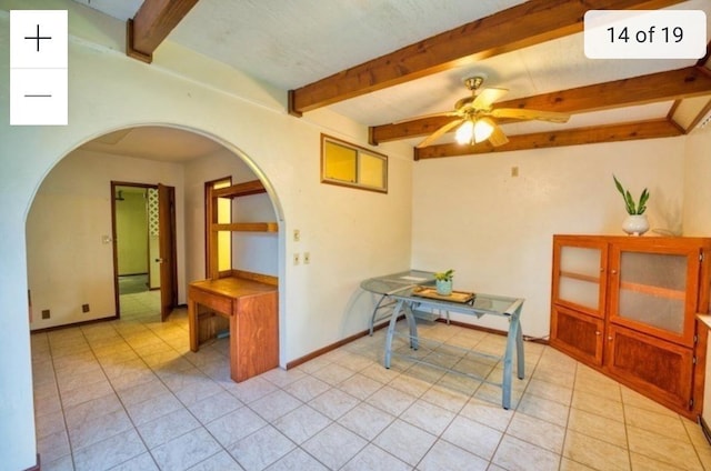 15-473 Anae St, Pahoa, HI 96778 - dining room featuring arched walkways, a ceiling fan, light tile patterned floors, beamed ceiling, and baseboards