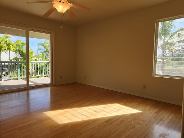 15-974 Lemiwai Rd, Keaau, HI 96749 - empty room featuring hardwood / wood-style floors, a ceiling fan, and baseboards