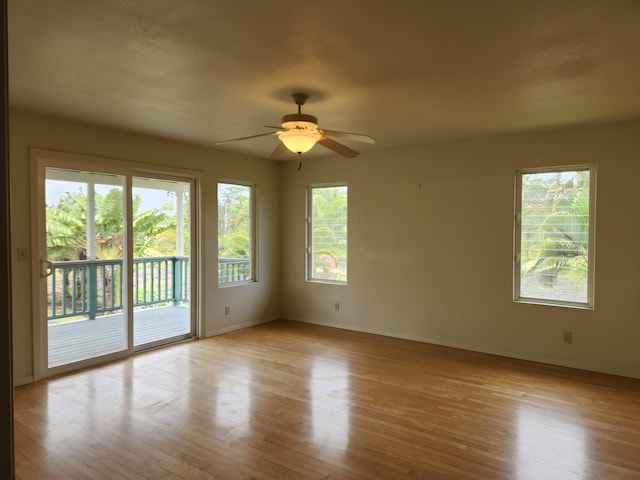 15-974 Lemiwai Rd, Keaau, HI 96749 - spare room with a ceiling fan, light wood-type flooring, and baseboards