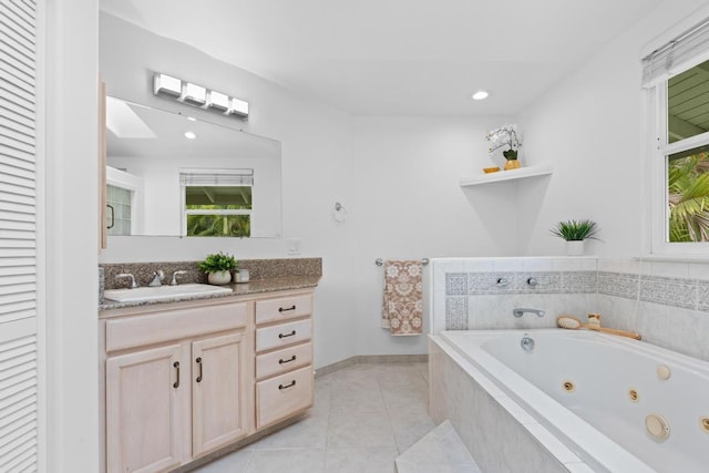 76-985 Aeo St, Kailua-Kona, HI 96740 - full bathroom with a tub with jets, tile patterned floors, vanity, recessed lighting, and baseboards