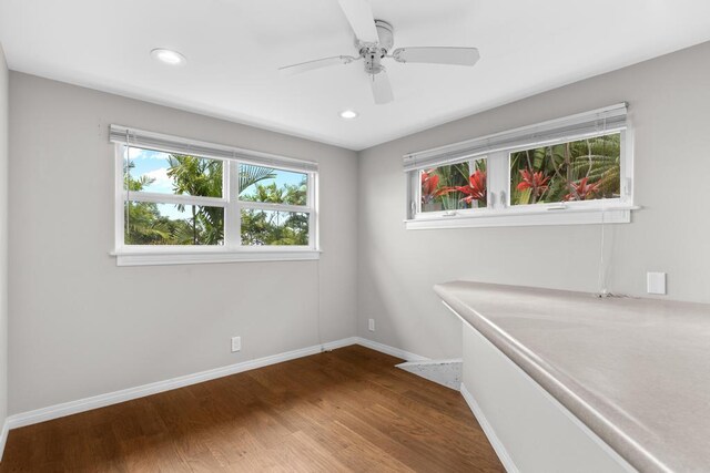 76-985 Aeo St, Kailua-Kona, HI 96740 - unfurnished room with wood finished floors, recessed lighting, a ceiling fan, and baseboards