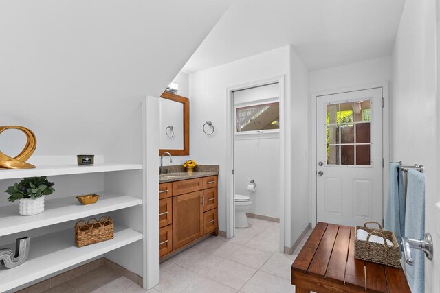 76-985 Aeo St, Kailua-Kona, HI 96740 - full bathroom featuring vanity, toilet, tile patterned flooring, and baseboards
