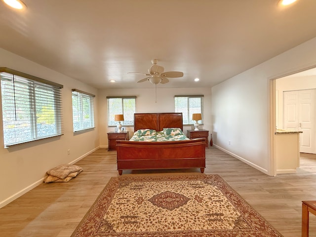 92-8858 Paradise Pkwy, Ocean View, HI 96737 - bedroom featuring recessed lighting, baseboards, light wood-style floors, and a ceiling fan