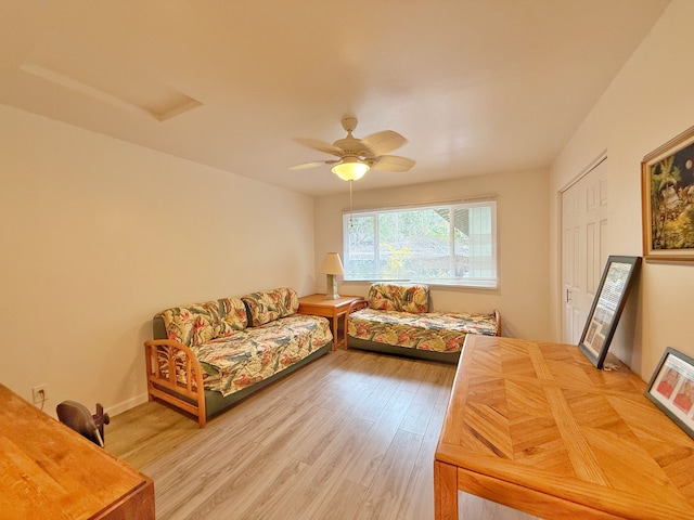 92-8858 Paradise Pkwy, Ocean View, HI 96737 - living room featuring attic access, wood finished floors, and a ceiling fan