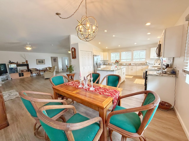 92-8858 Paradise Pkwy, Ocean View, HI 96737 - dining area with light wood-style floors, a chandelier, recessed lighting, vaulted ceiling, and a ceiling fan