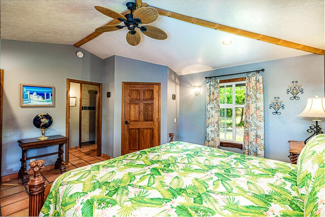 15-869 Lemiwai Rd, Keaau, HI 96749 - bedroom featuring lofted ceiling, tile patterned floors, and ceiling fan