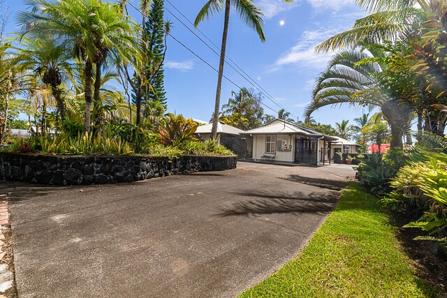 15-869 Lemiwai Rd, Keaau, HI 96749 - view of front facade featuring driveway