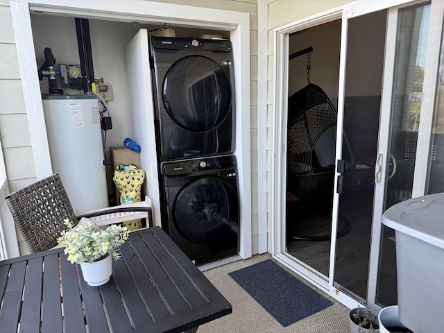73-1111 Nuuanu Pl Unit N103, Kailua-Kona, HI 96740 - laundry area featuring stacked washer / dryer and water heater