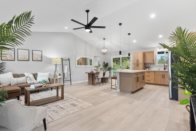 16-2084 Macadamia Dr, Pahoa, HI 96778 - living area with light wood finished floors, ceiling fan, recessed lighting, baseboards, and high vaulted ceiling