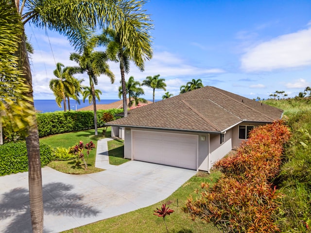 76-6398 Pualani St Unit 7, Kailua-Kona, HI 96740 - ranch-style house with a garage, a front lawn, stucco siding, driveway, and roof with shingles