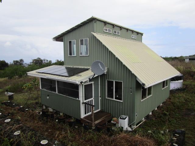 89-902 Rd Rd, Captain Cook, HI 96704 - rear view of property with a sunroom and metal roof