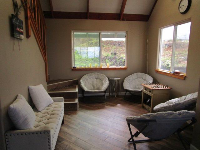 89-902 Rd Rd, Captain Cook, HI 96704 - sitting room featuring healthy amount of natural light and hardwood / wood-style floors