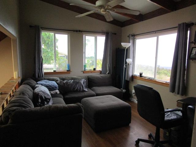 89-902 Rd Rd, Captain Cook, HI 96704 - living room featuring wood finished floors and a ceiling fan