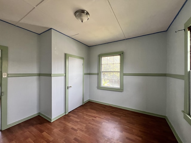 95-5587-A Mamalahoa Hwy, Naalehu, HI 96772 - unfurnished bedroom featuring wood finished floors and baseboards