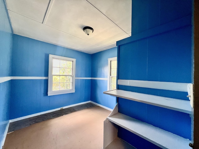 95-5587-A Mamalahoa Hwy, Naalehu, HI 96772 - unfurnished room with unfinished concrete flooring and baseboards