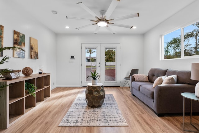 16-2143 Uilani Dr, Pahoa, HI 96778 - living area featuring healthy amount of natural light, a ceiling fan, recessed lighting, light wood-style flooring, and baseboards