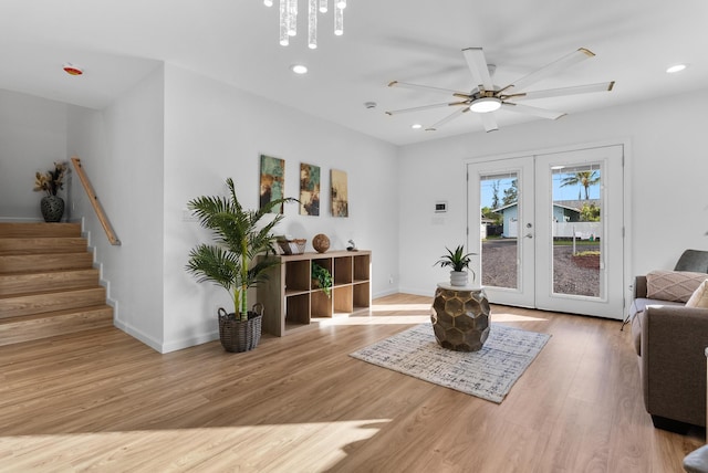 16-2143 Uilani Dr, Pahoa, HI 96778 - sitting room featuring light wood-style flooring, recessed lighting, ceiling fan, baseboards, and stairway