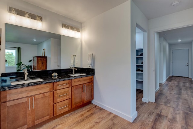 16-1516 Pohaku Cir, Keaau, HI 96749 - full bath with wood finished floors, double vanity, baseboards, and recessed lighting