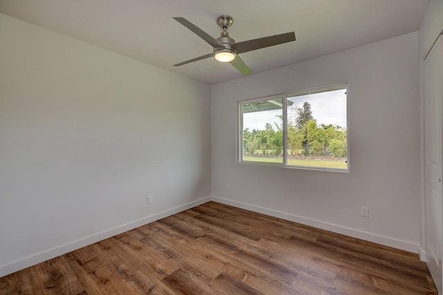 16-1516 Pohaku Cir, Keaau, HI 96749 - empty room featuring wood finished floors, baseboards, and ceiling fan