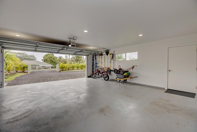 16-1516 Pohaku Cir, Keaau, HI 96749 - garage featuring a garage door opener and recessed lighting