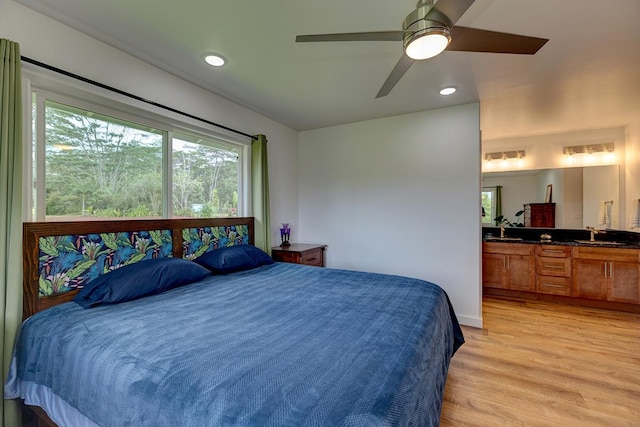 16-1516 Pohaku Cir, Keaau, HI 96749 - bedroom featuring light wood-style flooring, recessed lighting, a sink, and ceiling fan