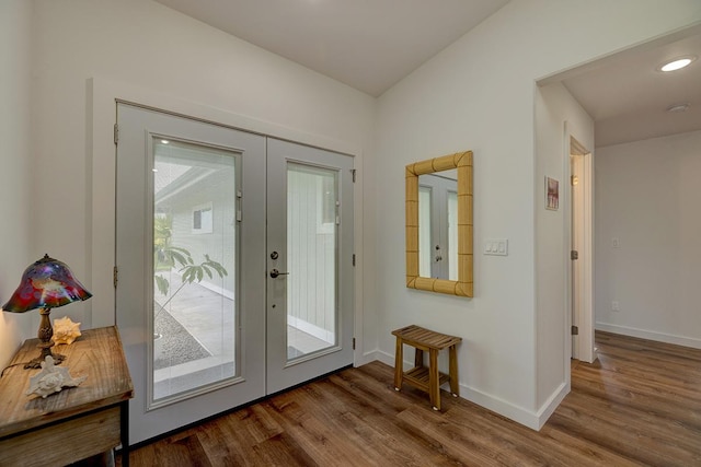 16-1516 Pohaku Cir, Keaau, HI 96749 - doorway with french doors, wood finished floors, baseboards, and recessed lighting