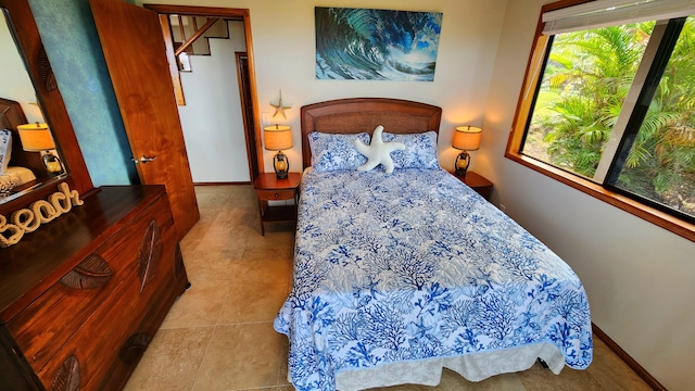 76-6320 Kololia St, Kailua-Kona, HI 96740 - tiled bedroom with baseboards