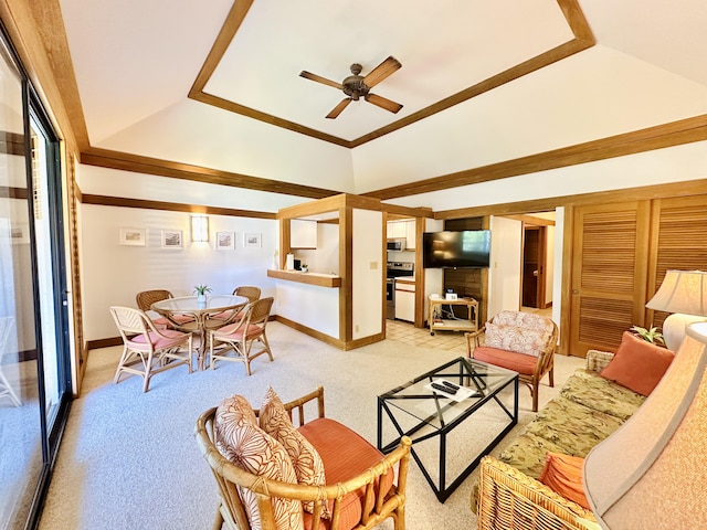 2253 Poipu Rd Unit 446, Koloa, HI 96756 - living room with a tray ceiling, ceiling fan, baseboards, and light colored carpet
