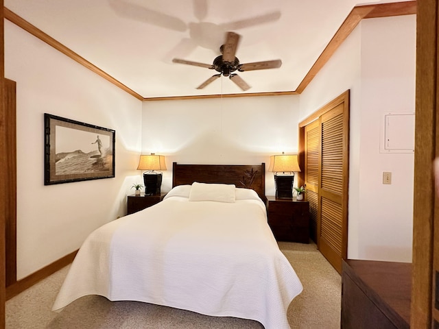 2253 Poipu Rd Unit 446, Koloa, HI 96756 - bedroom featuring a closet, light colored carpet, crown molding, and ceiling fan
