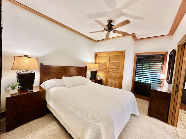 2253 Poipu Rd Unit 446, Koloa, HI 96756 - bedroom featuring a closet, ceiling fan, and crown molding