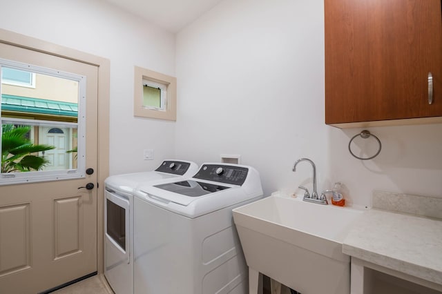 4306 Pilimai St, Lihue, HI 96766 - laundry area with washing machine and clothes dryer and cabinet space