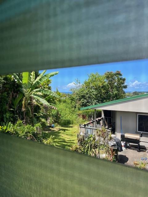 470 Hoopuni St, Hilo, HI 96720 - view of yard featuring a patio area