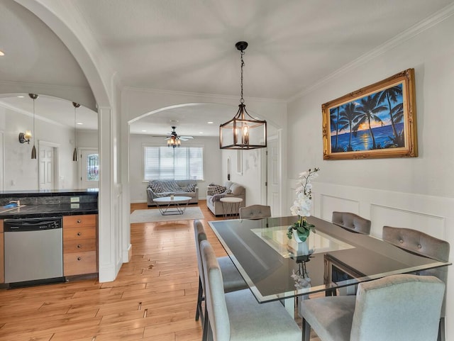 16-2069 Leilani Dr, Pahoa, HI 96778 - dining area with arched walkways, light wood finished floors, a ceiling fan, ornamental molding, and recessed lighting