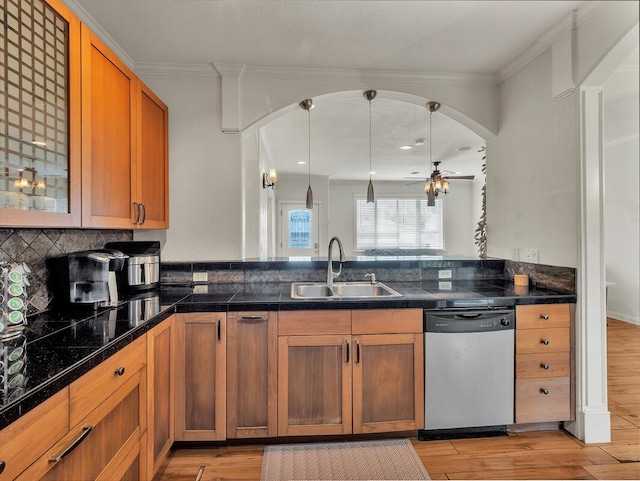 16-2069 Leilani Dr, Pahoa, HI 96778 - kitchen featuring stainless steel dishwasher, a sink, arched walkways, a peninsula, and a ceiling fan