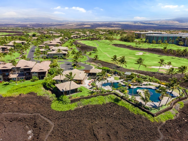69-1033 Nawahine Pl Unit 1G, Waikoloa, HI 96738 - drone / aerial view of a mountainous background and a golf club