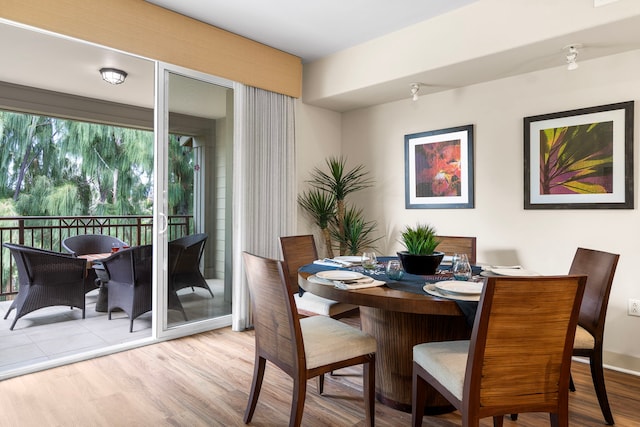 69-1033 Nawahine Pl Unit 1G, Waikoloa, HI 96738 - dining room featuring wood finished floors