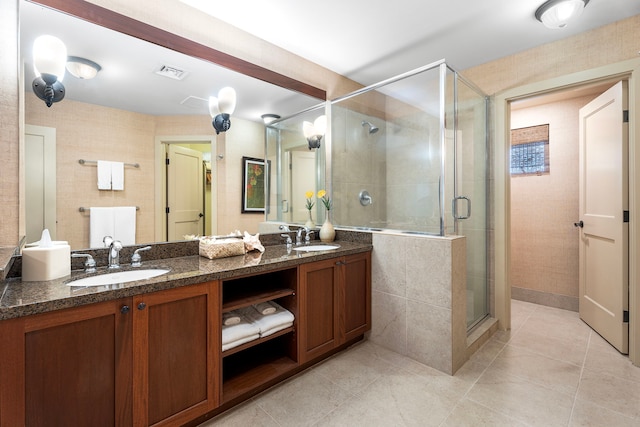 69-1033 Nawahine Pl Unit 1G, Waikoloa, HI 96738 - full bath featuring tile patterned floors, a shower stall, and double vanity