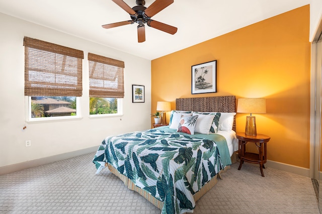 69-1033 Nawahine Pl Unit 1G, Waikoloa, HI 96738 - bedroom with carpet floors, baseboards, and ceiling fan