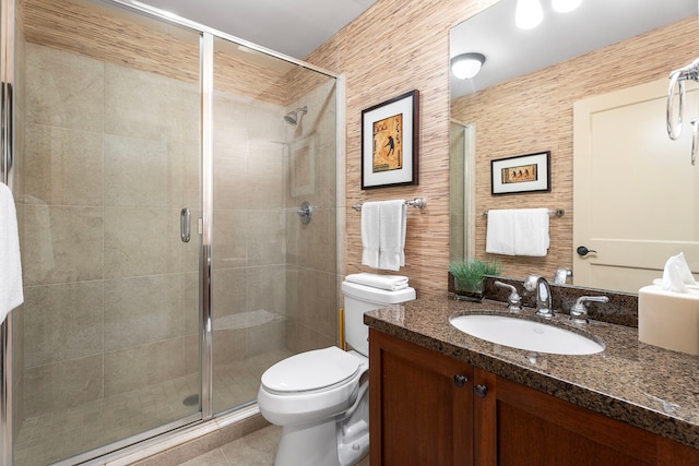 69-1033 Nawahine Pl Unit 1G, Waikoloa, HI 96738 - full bathroom with vanity, toilet, a stall shower, and tile patterned floors