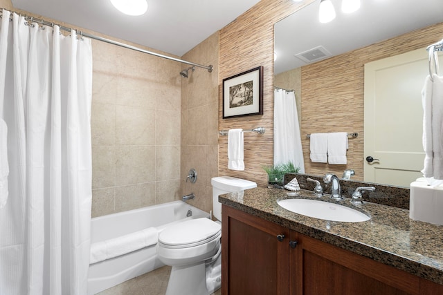 69-1033 Nawahine Pl Unit 1G, Waikoloa, HI 96738 - bathroom with vanity, shower / tub combo with curtain, toilet, tile patterned flooring, and tile walls